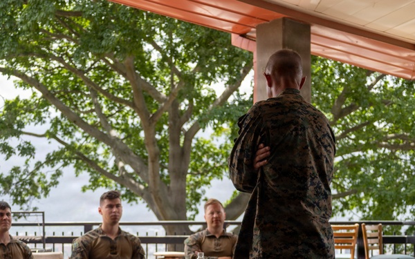 Maj. Gen. Jarrard Speaks With Marine at U.S. Embassy Caracas