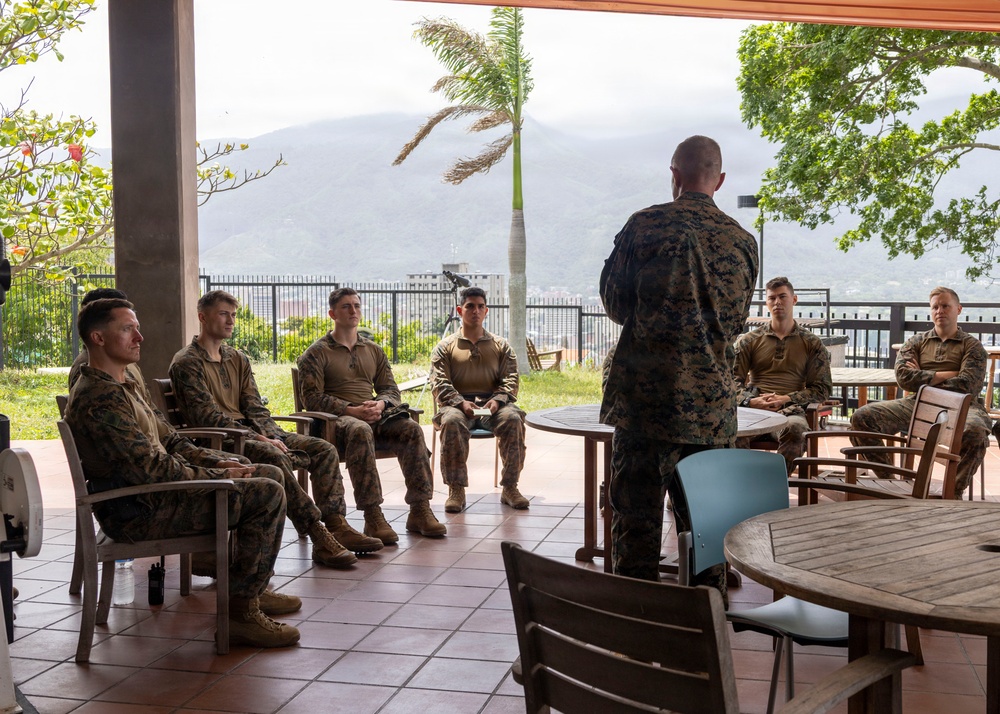 Maj. Gen. Jarrard Speaks With Marine at U.S. Embassy Caracas