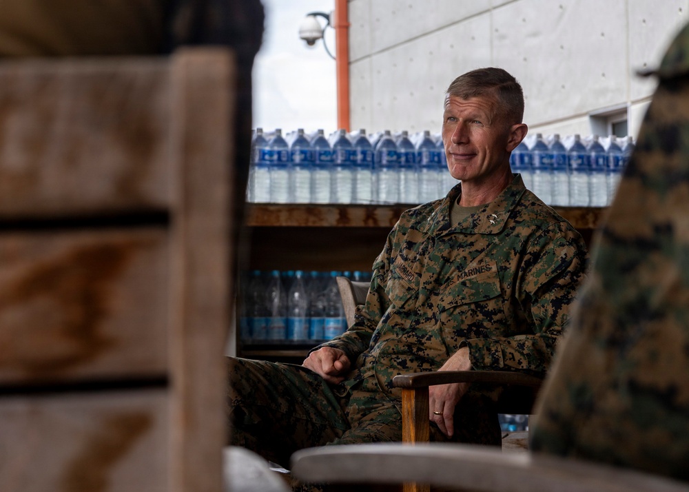 Maj. Gen. Jarrard Speaks With Marine at U.S. Embassy Caracas