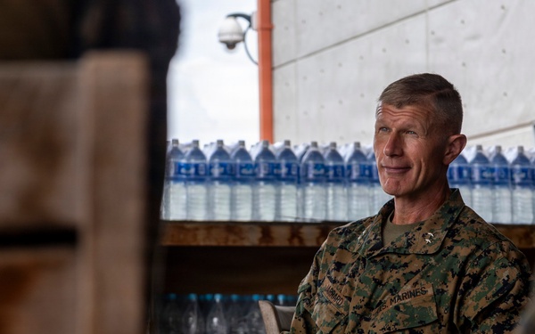 Maj. Gen. Jarrard Speaks With Marine at U.S. Embassy Caracas