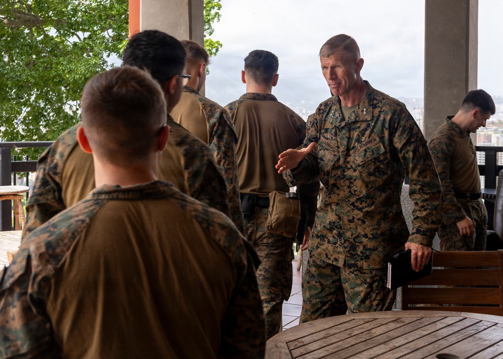 Maj. Gen. Jarrard Speaks With Marine at U.S. Embassy Caracas