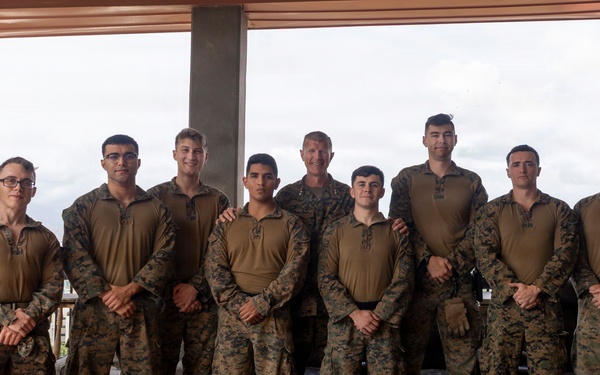 Maj. Gen. Jarrard Speaks With Marine at U.S. Embassy Caracas