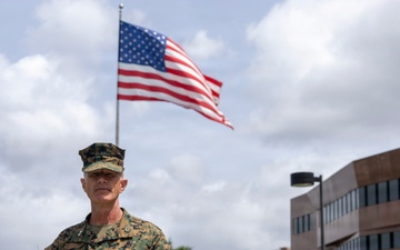 Maj. Gen. Jarrard Speaks With Marine at U.S. Embassy Caracas
