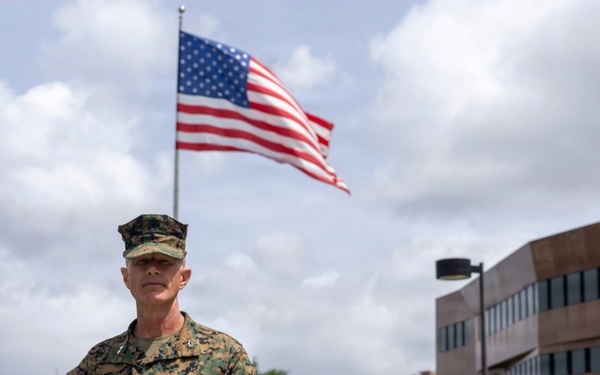 Maj. Gen. Jarrard Speaks With Marine at U.S. Embassy Caracas
