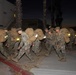 1st Combat Readiness Regiment Marines and Sailors participate in a 10k night hike