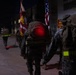 1st Combat Readiness Regiment Marines and Sailors participate in a 10k night hike