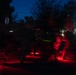 1st Combat Readiness Regiment Marines and Sailors participate in a 10k night hike
