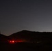 1st Combat Readiness Regiment Marines and Sailors participate in a 10k night hike