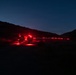 1st Combat Readiness Regiment Marines and Sailors participate in a 10k night hike