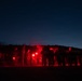 1st Combat Readiness Regiment Marines and Sailors participate in a 10k night hike