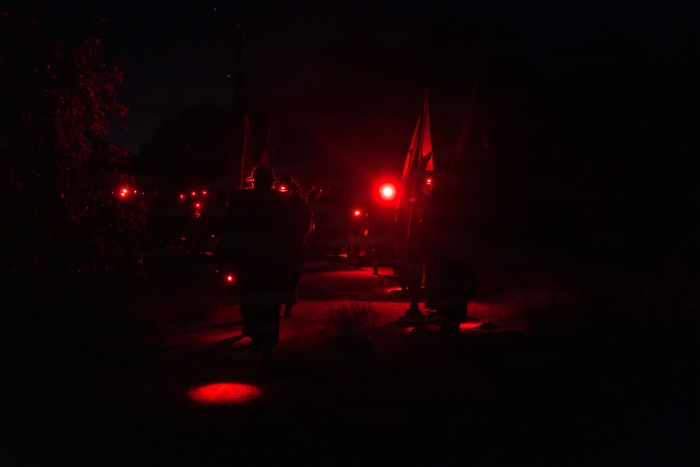 1st Combat Readiness Regiment Marines and Sailors participate in a 10k night hike