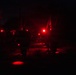 1st Combat Readiness Regiment Marines and Sailors participate in a 10k night hike