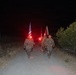 1st Combat Readiness Regiment Marines and Sailors participate in a 10k night hike