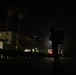 1st Combat Readiness Regiment Marines and Sailors participate in a 10k night hike