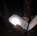 1st Combat Readiness Regiment Marines and Sailors participate in a 10k night hike