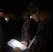1st Combat Readiness Regiment Marines and Sailors participate in a 10k night hike