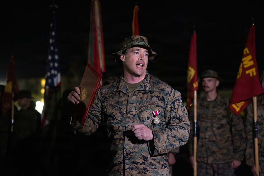 1st Combat Readiness Regiment Marines and Sailors participate in a 10k night hike