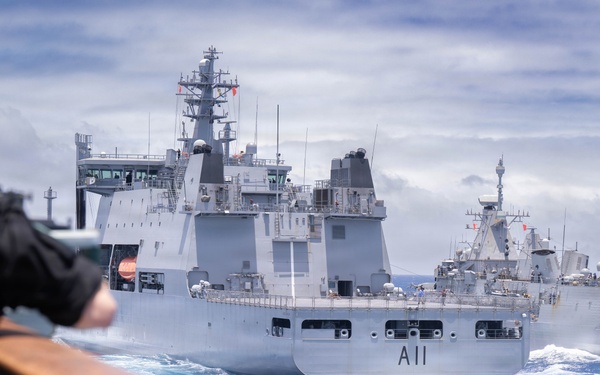 Canadian Halifax-class frigate Regina (FFH 334) participates in a replenishment at sea with HMNZS Aotearoa (A11)