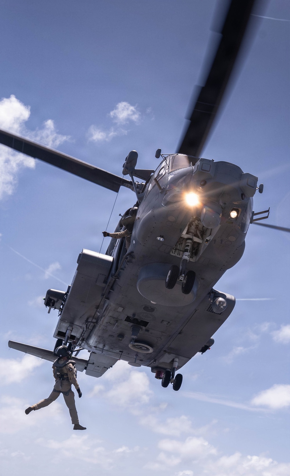 Canadian Halifax-class frigate Regina air department participates in hoisting exercises with Canadian Helicopter CH-144 Cyclone
