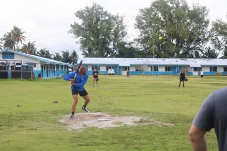 Marines with MCED-P and local Palauan's compete in a softball match