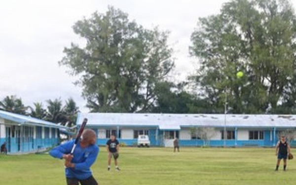 Marines with MCED-P and local Palauan's compete in a softball match