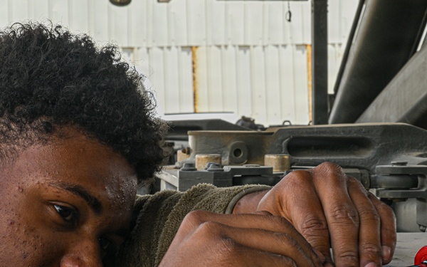 Vehicle maintenance specialist fixes aircraft cargo loader in AOR