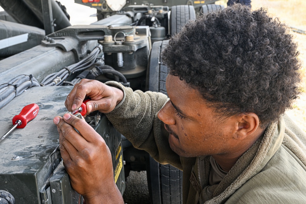 Vehicle maintenance specialist fixes aircraft cargo loader in AOR