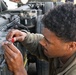 Vehicle maintenance specialist fixes aircraft cargo loader in AOR