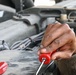 Vehicle maintenance specialist fixes aircraft cargo loader in AOR