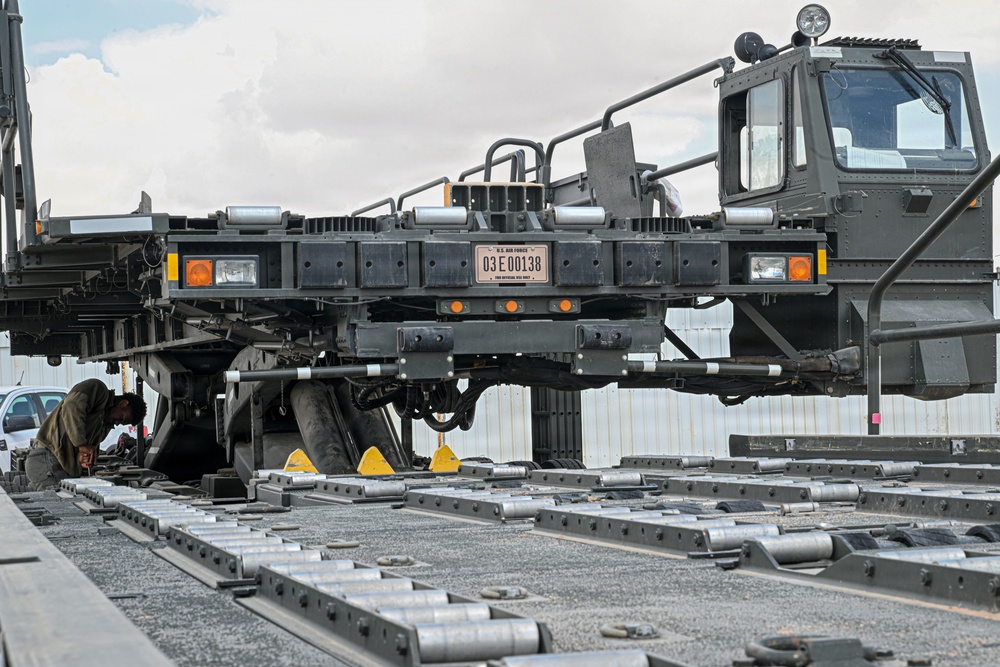 Vehicle maintenance specialist fixes aircraft cargo loader in AOR