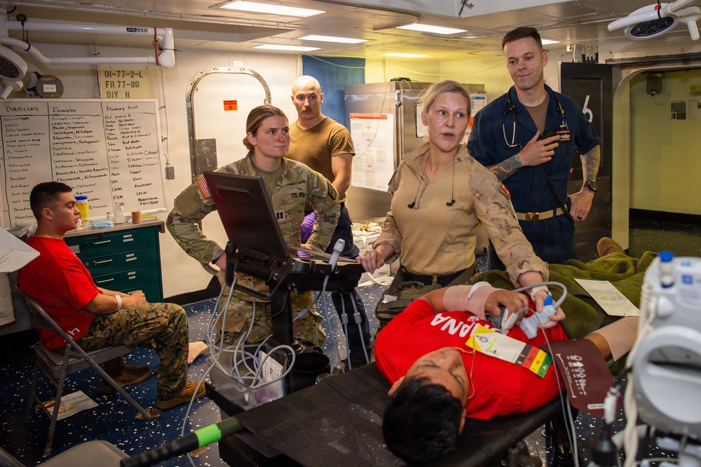 RIMPAC servicemembers conduct mass casualty drill Aboard USS Essex