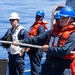 USS Mustin conducts an integrated training team drill