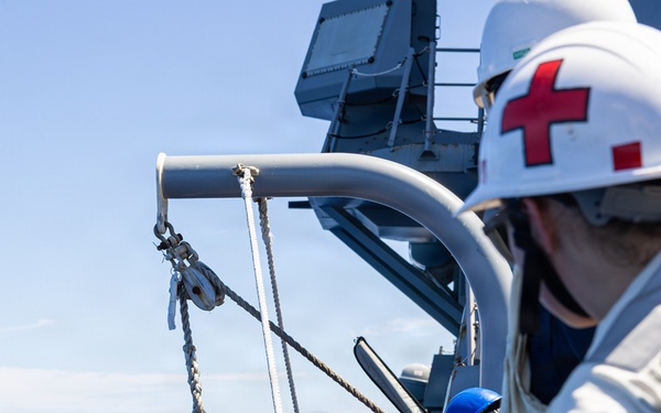 USS Mustin conducts an integrated training team drill
