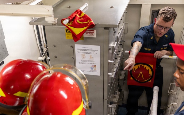 USS Mustin conducts an integrated training team drill