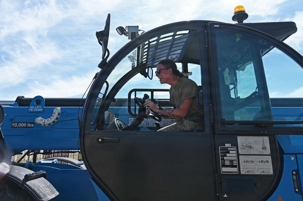 119th Airman Operates Telehandler