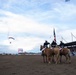 U.S. Marine Corps Mounted Color Guard participates in the Cody Stampede