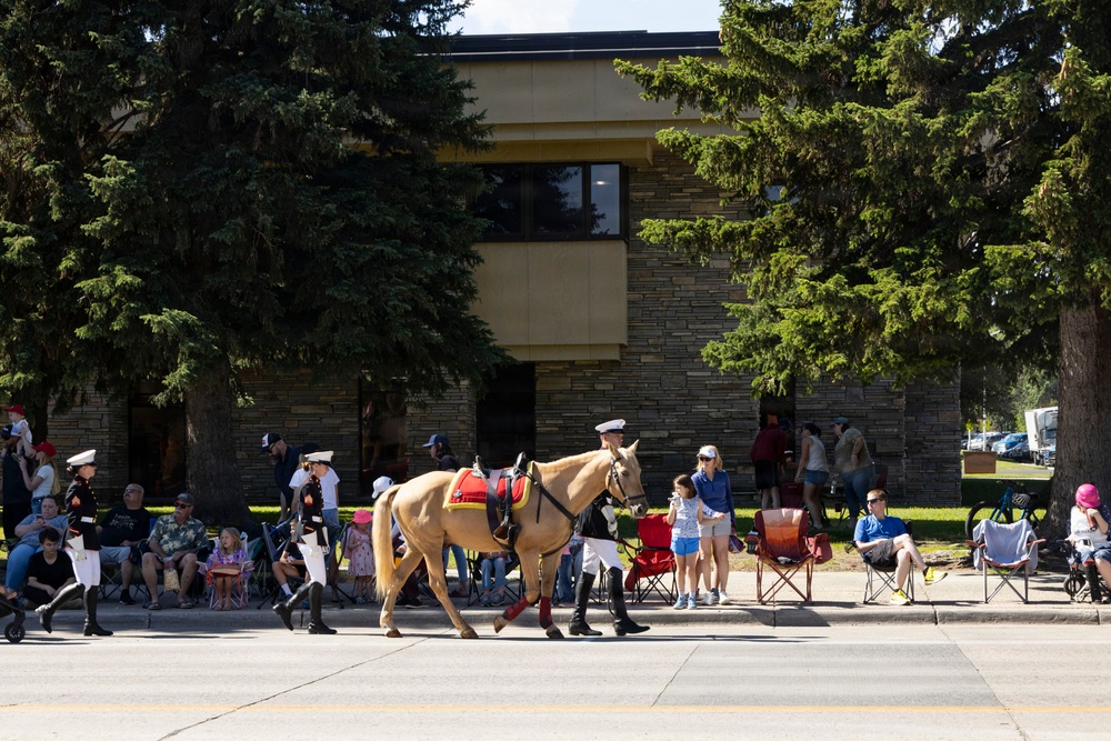 U.S. Marine Corps Mounted Color Guard participates in the Cody Stampede