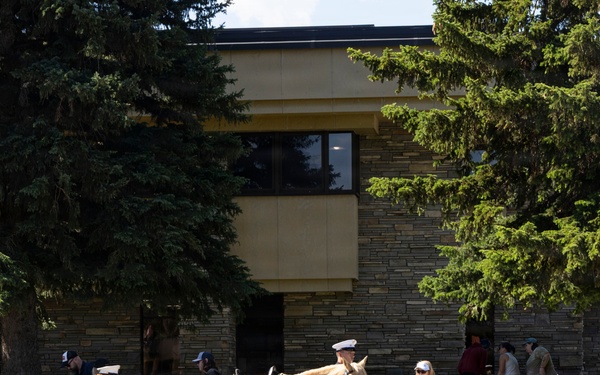 U.S. Marine Corps Mounted Color Guard participates in the Cody Stampede