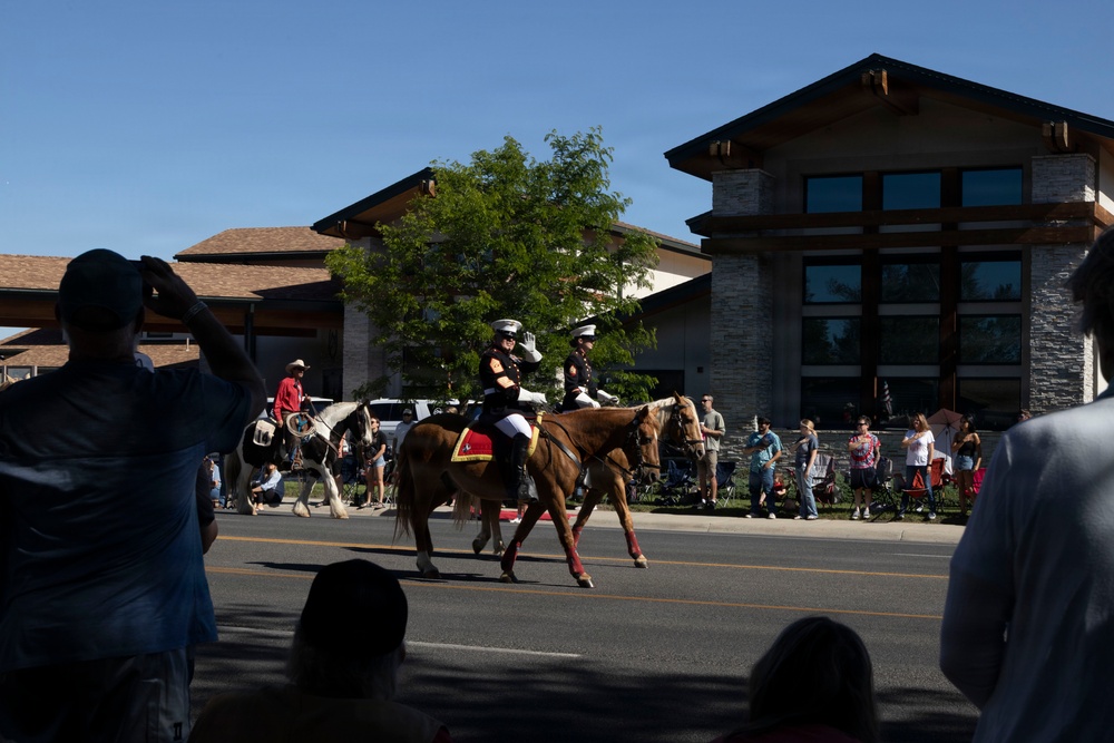 U.S. Marine Corps Mounted Color Guard participates in the Cody Stampede