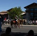 U.S. Marine Corps Mounted Color Guard participates in the Cody Stampede