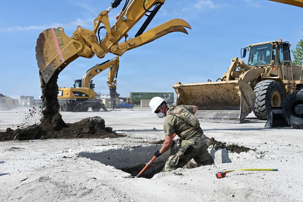 119th Wing Airman Prepares the Subgrade of a Crater