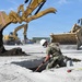119th Wing Airman Prepares the Subgrade of a Crater