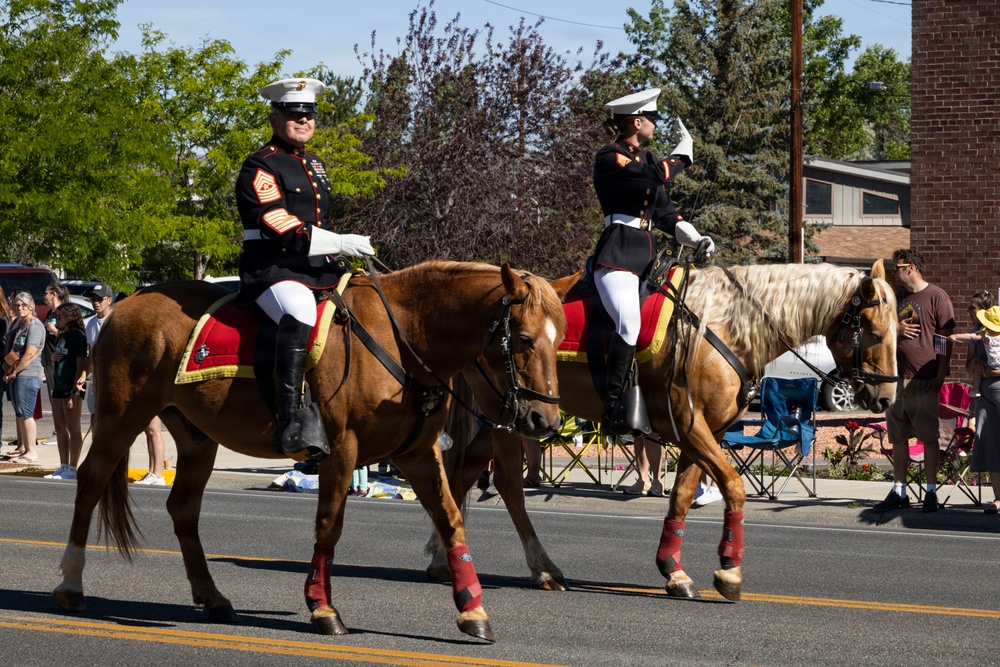 U.S. Marine Corps Mounted Color Guard participates in the Cody Stampede