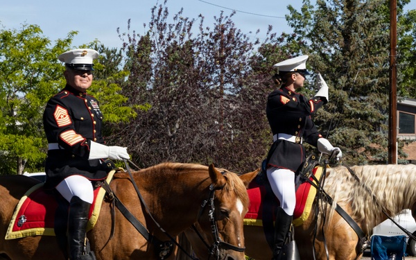 U.S. Marine Corps Mounted Color Guard participates in the Cody Stampede