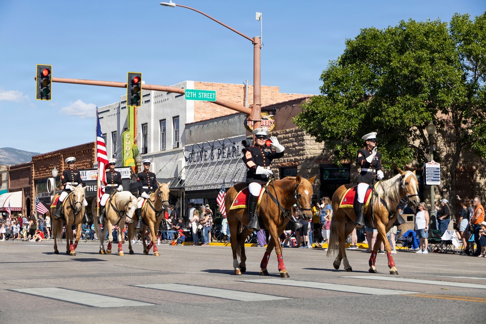 U.S. Marine Corps Mounted Color Guard participates in the Cody Stampede