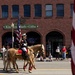 U.S. Marine Corps Mounted Color Guard participates in the Cody Stampede