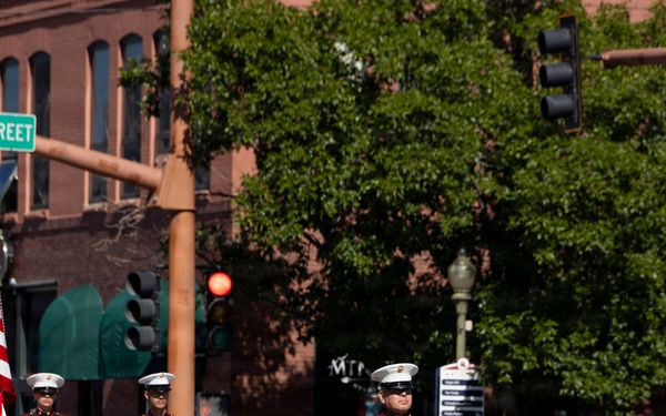 U.S. Marine Corps Mounted Color Guard participates in the Cody Stampede