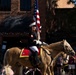 U.S. Marine Corps Mounted Color Guard participates in the Cody Stampede