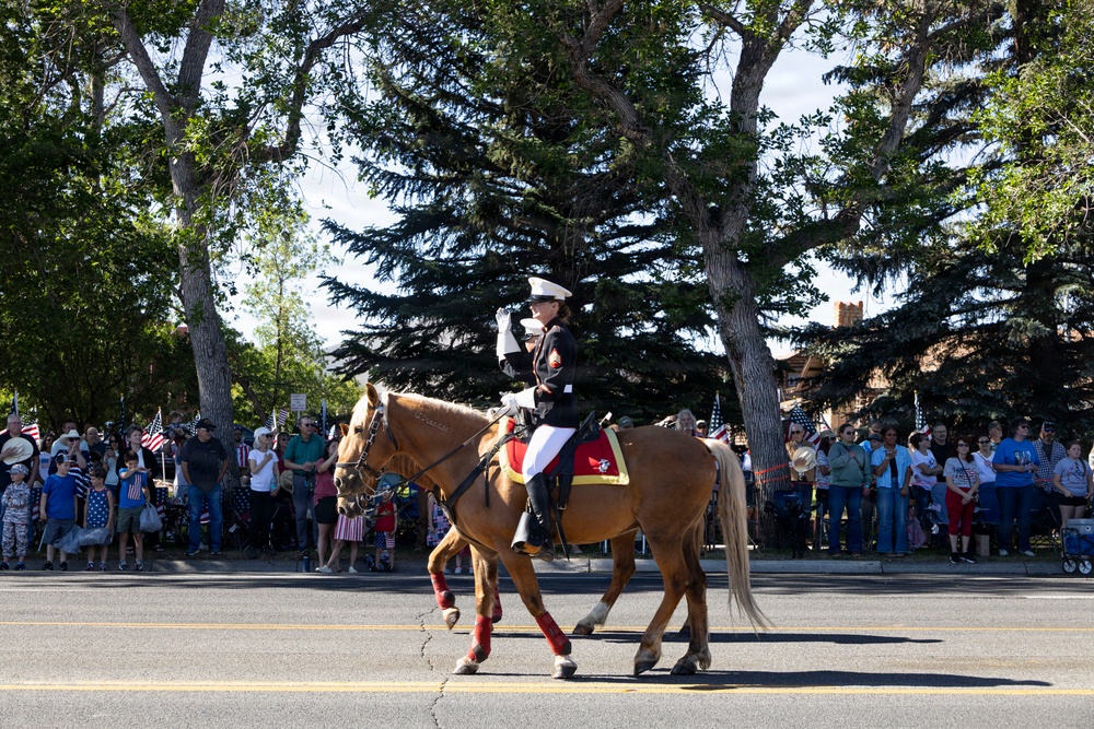 U.S. Marine Corps Mounted Color Guard participates in the Cody Stampede