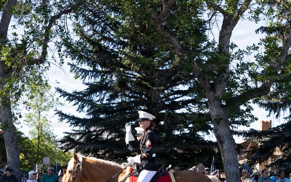 U.S. Marine Corps Mounted Color Guard participates in the Cody Stampede